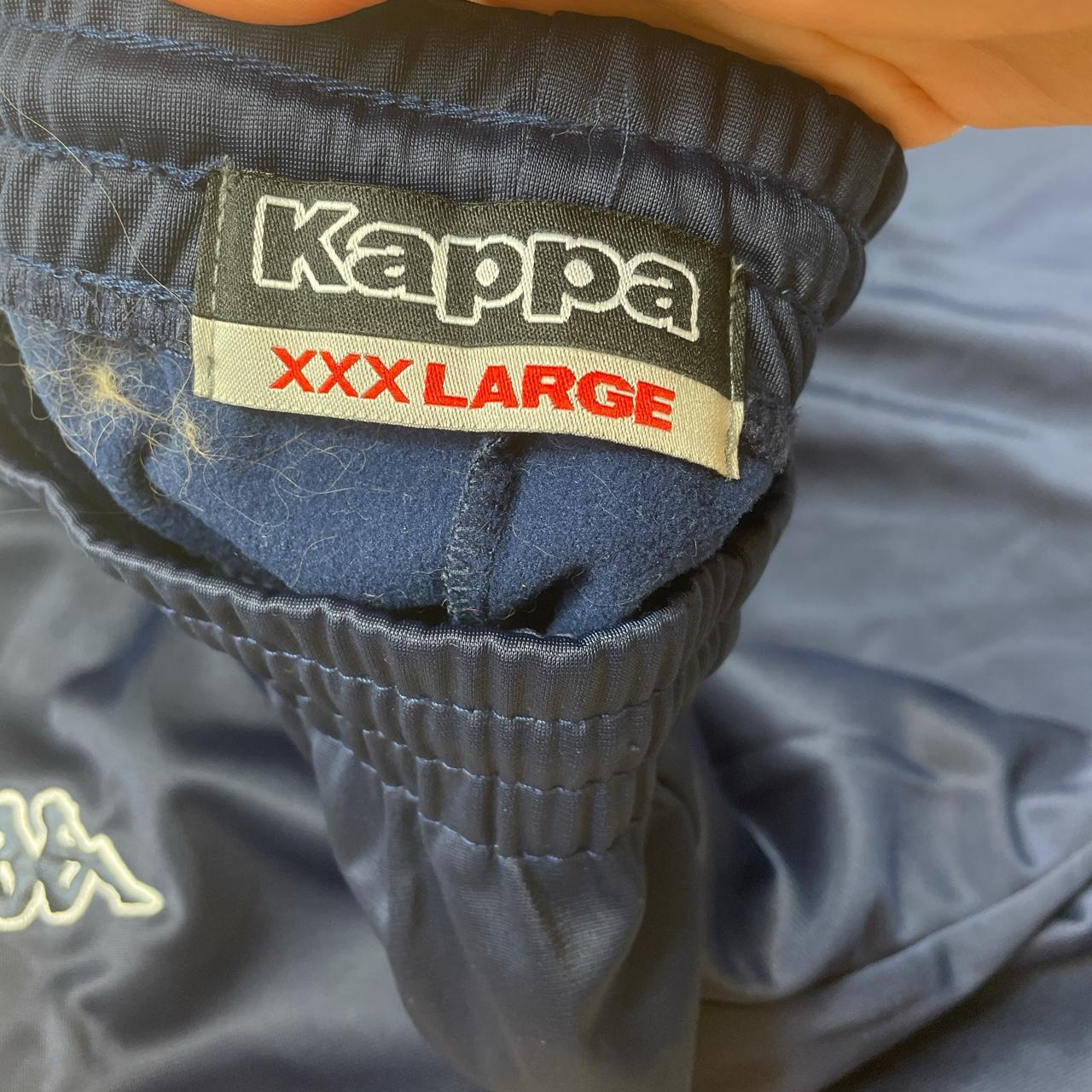 Vintage kappa navy joggers/tracksuit bottoms with... - Depop
