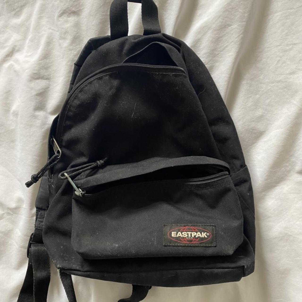 Great condition Black Mini Eastpak backpack /... - Depop