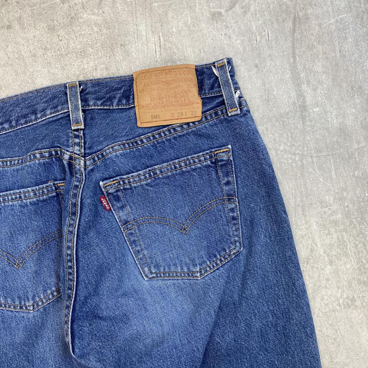 Vintage 90s Levi’s 501 denim jeans in a mid blue... - Depop