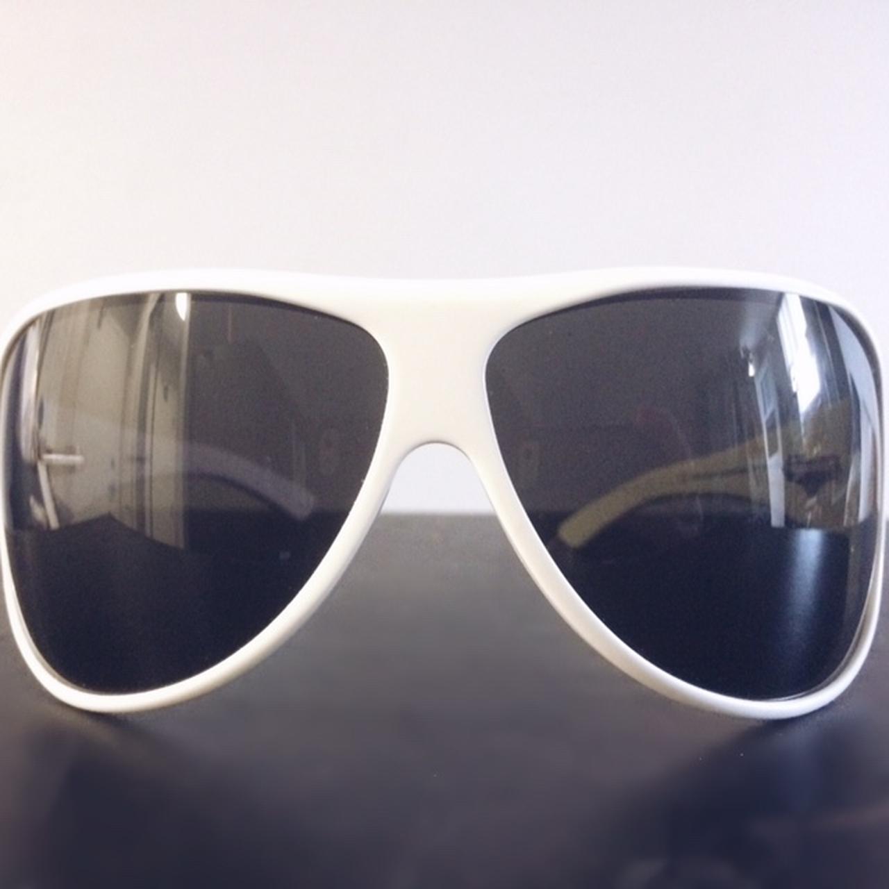 Yves Saint Laurent Gold Wrap-Around Sunglasses