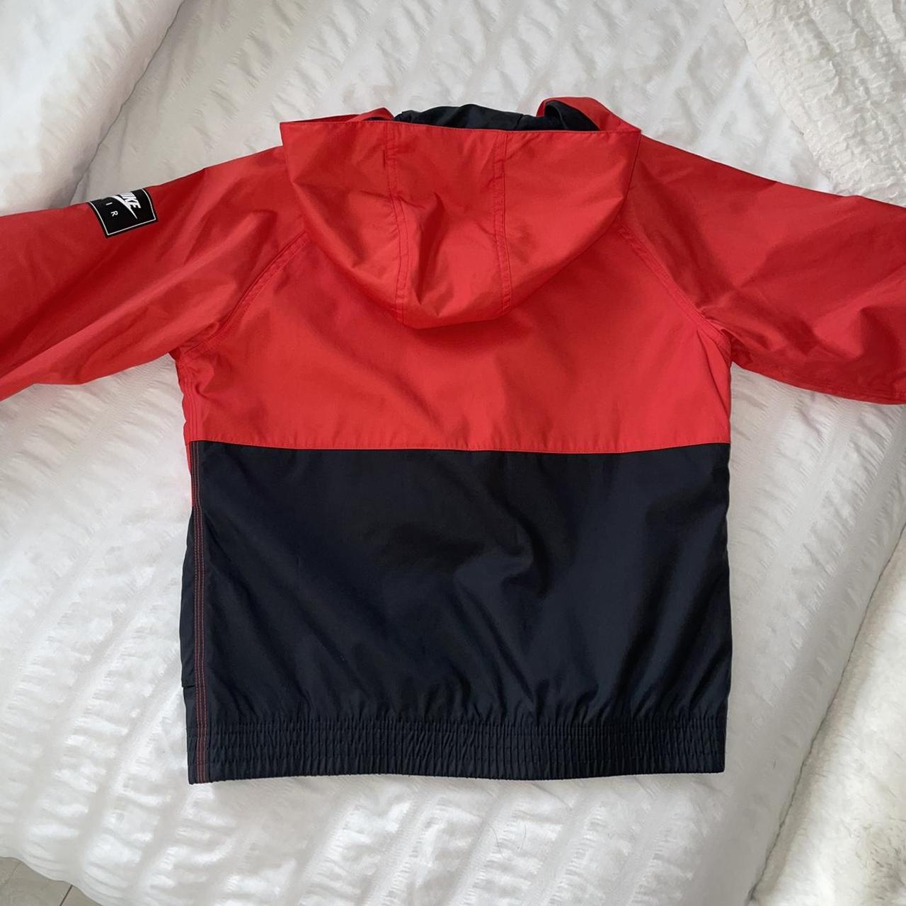 red and black nike coat