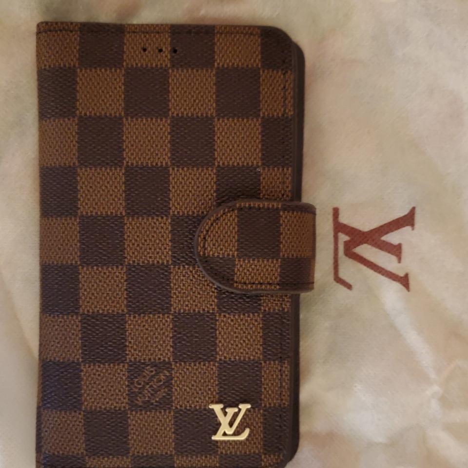 Louis Vuitton Universal phone case / wallet Never - Depop
