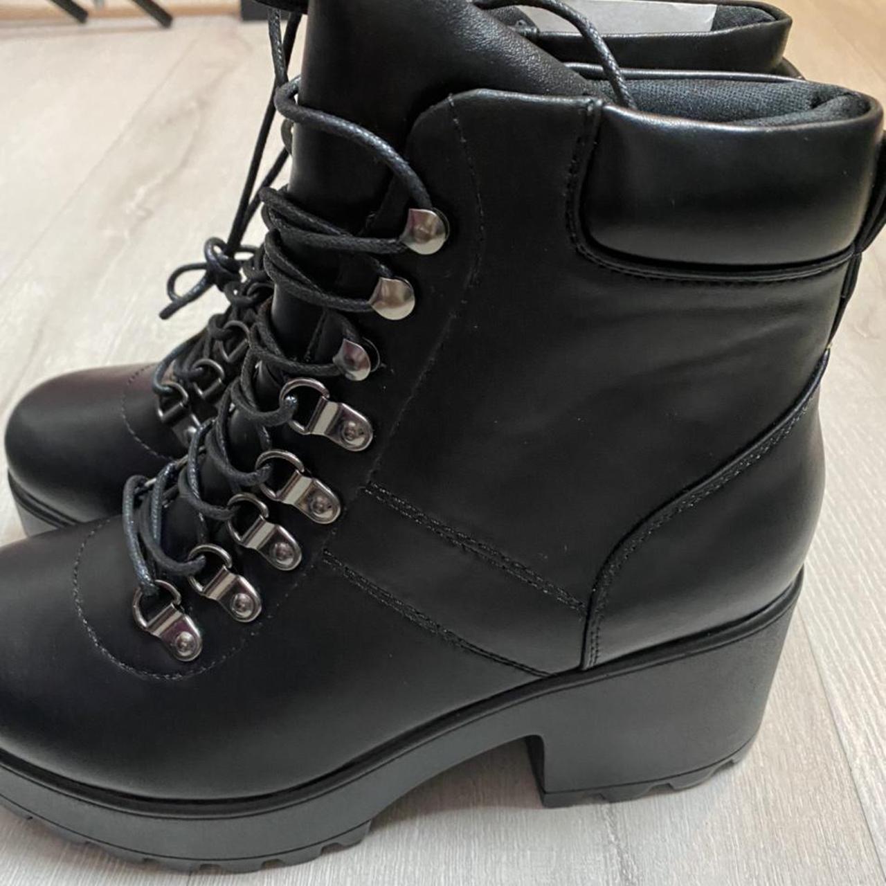 Black faux leather combat boots. Brand new (no box).... Depop