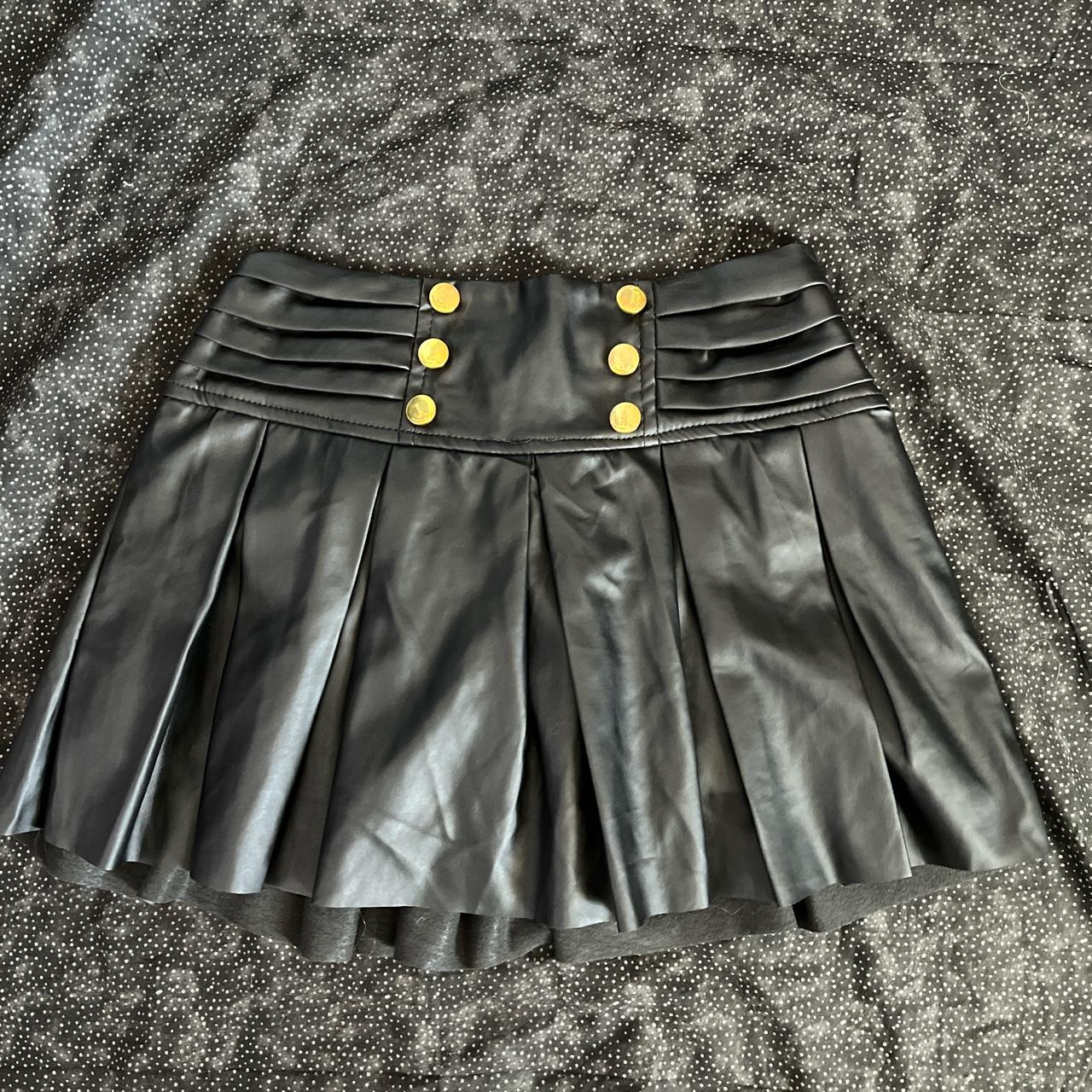Fake leather stretchy waistband skirt w/ golden... Depop
