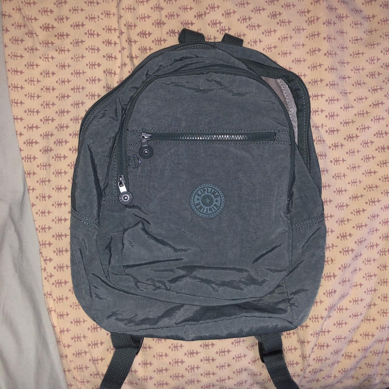 Medium sized sage green Kipling backpack in great... - Depop