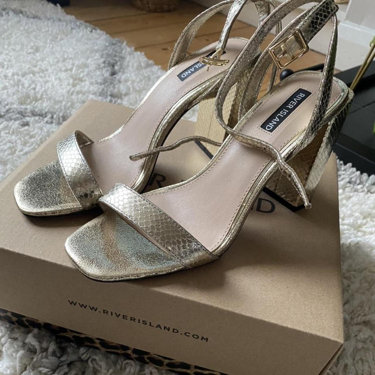River island gold sandals . Worn twice. Selling as... Depop