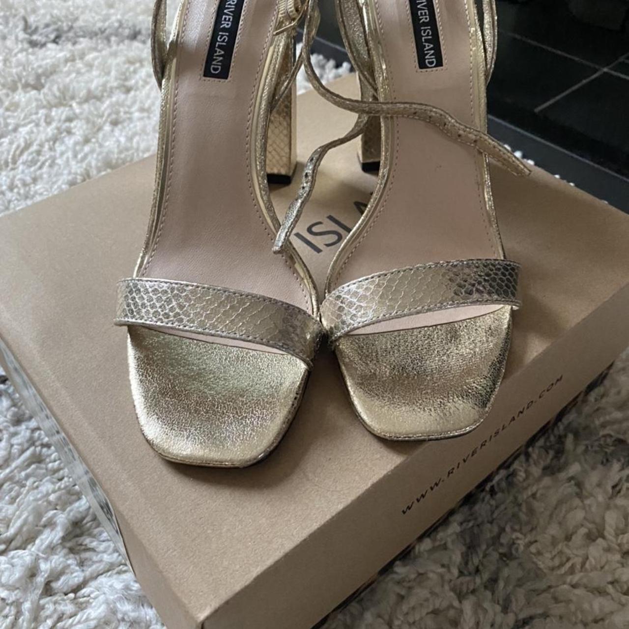 River island gold sandals . Worn twice. Selling as... Depop