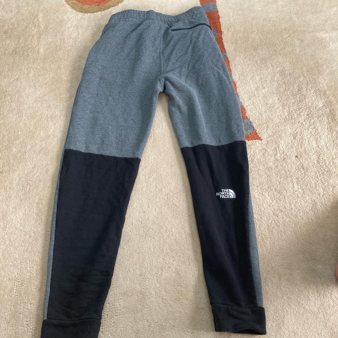 North face grey and black tracksuit bottoms Small... - Depop
