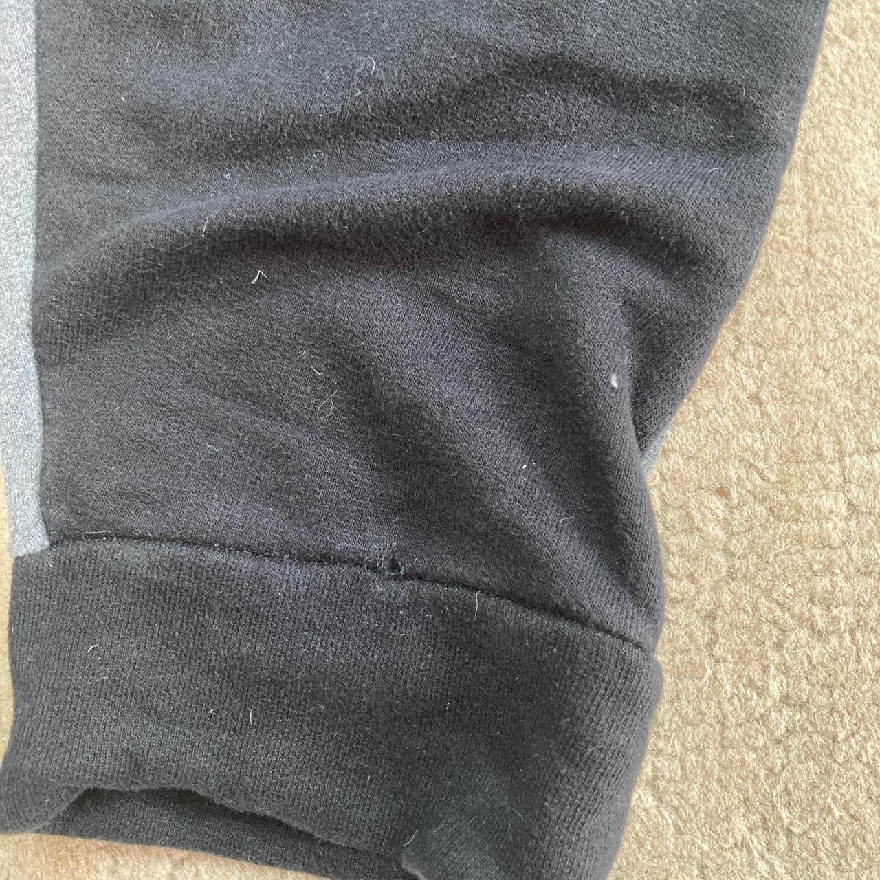 North face grey and black tracksuit bottoms Small... Depop