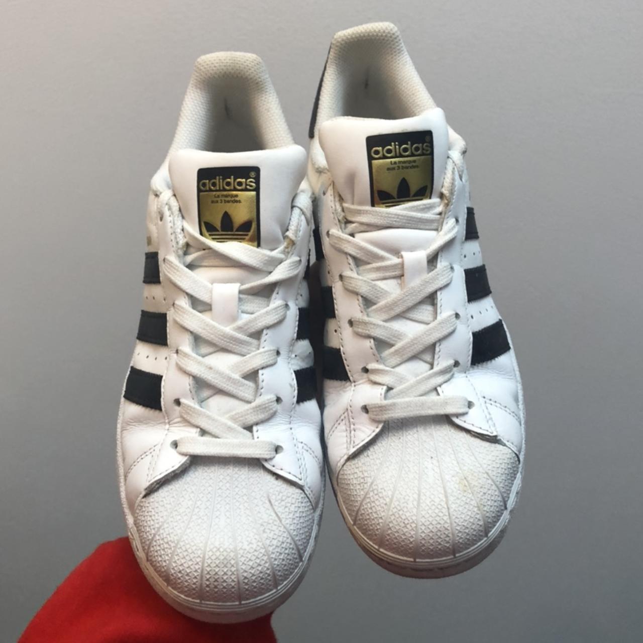 Black and white Adidas Superstars size euro 40 US