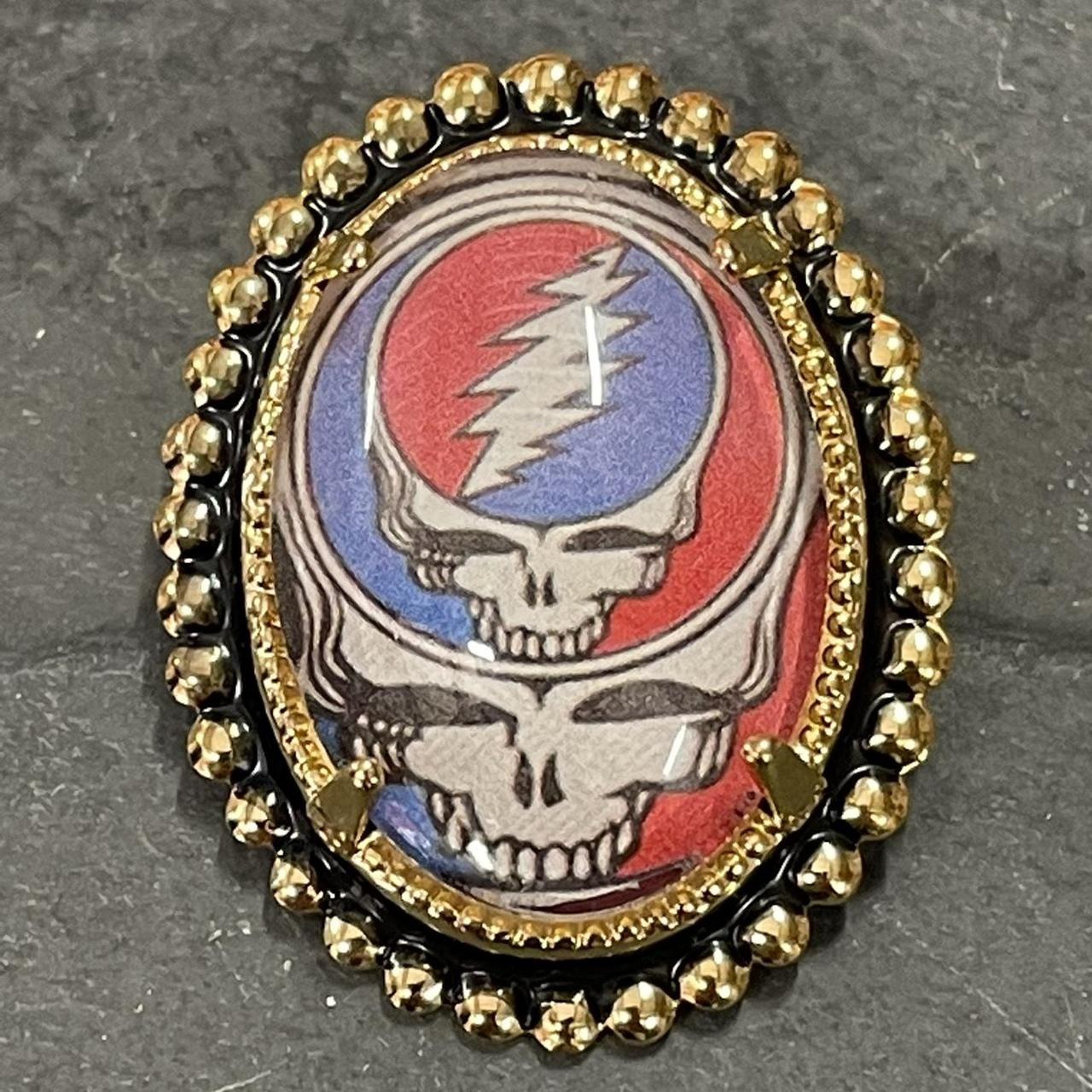 Vintage Grateful Dead brooch pin. This gold tone