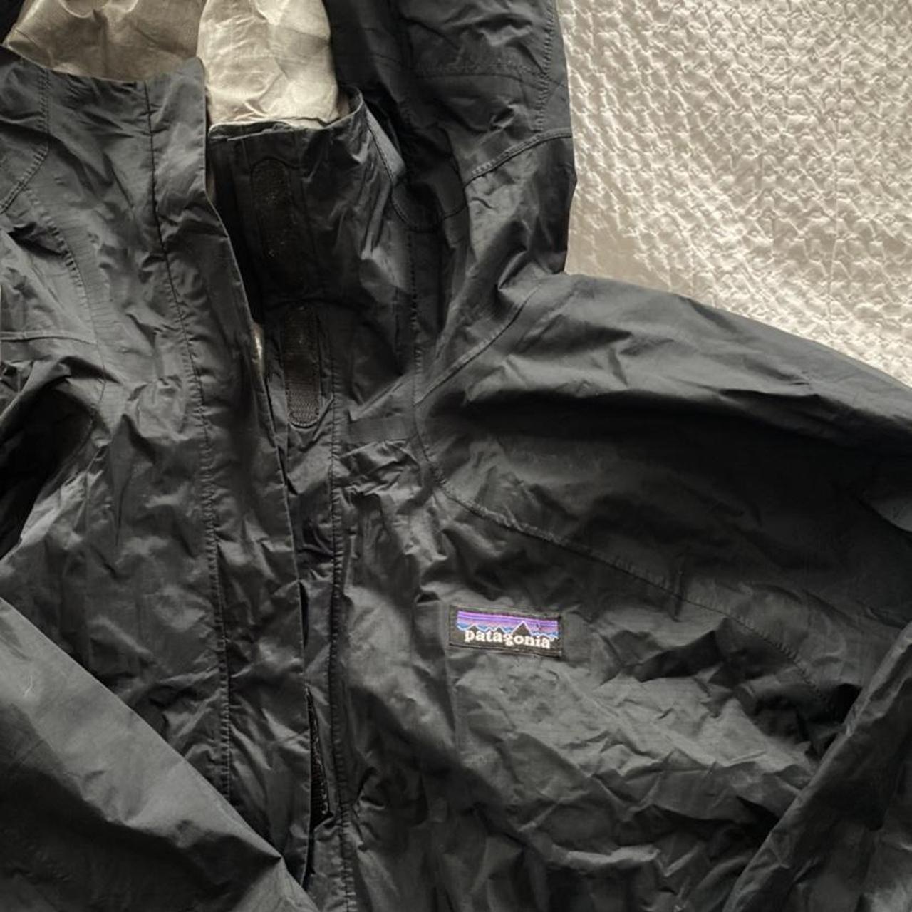 Black Patagonia rain jacket women’s XL but fits me... - Depop