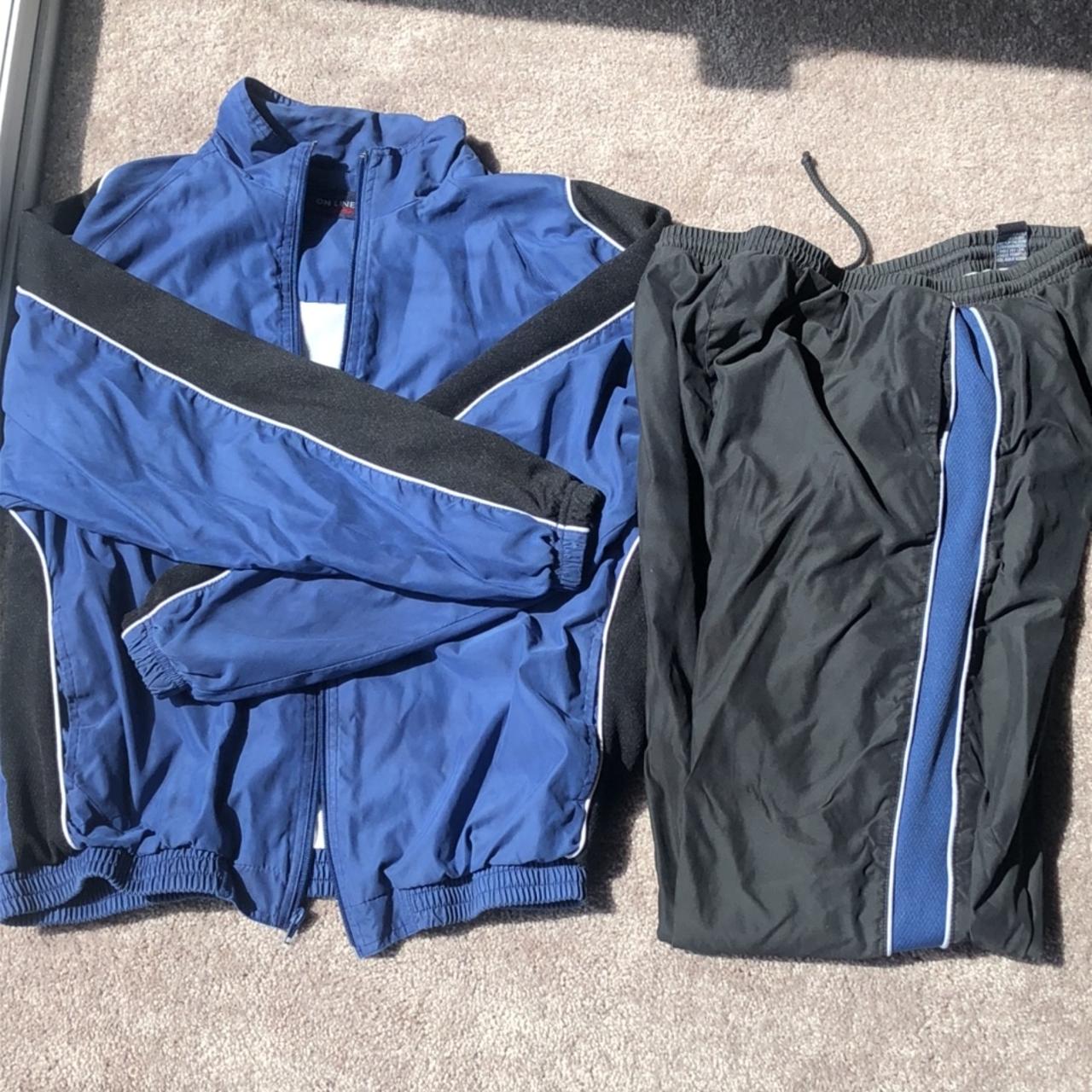 This is a vintage royal blue and black track suit.... - Depop