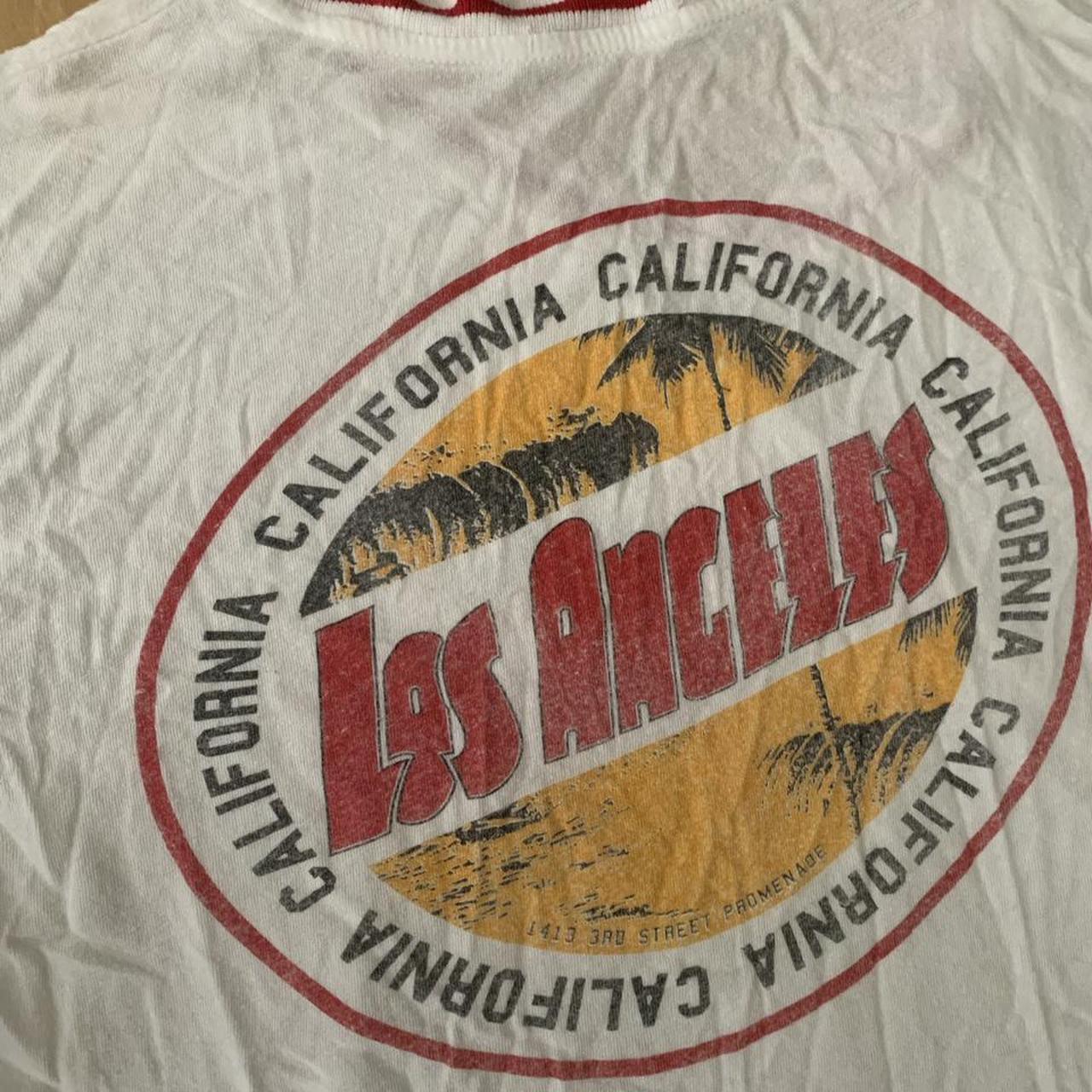 Brandy Melville Cropped Graphic Tee losangeles... Depop