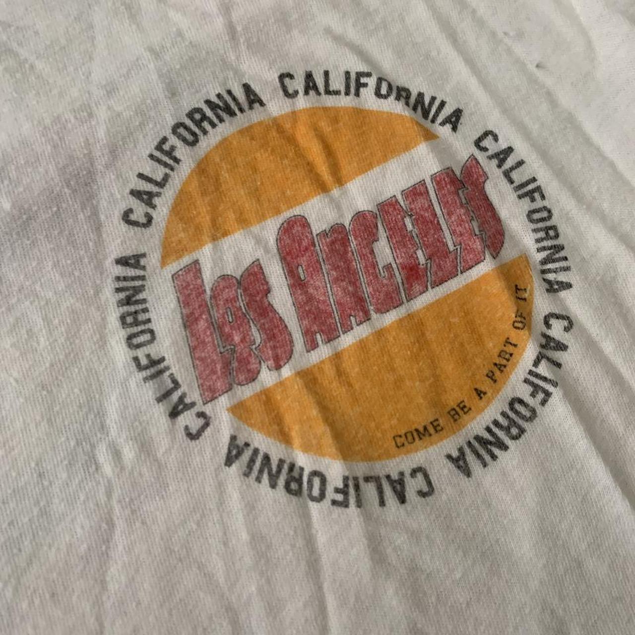 Brandy Melville Cropped Graphic Tee losangeles... Depop