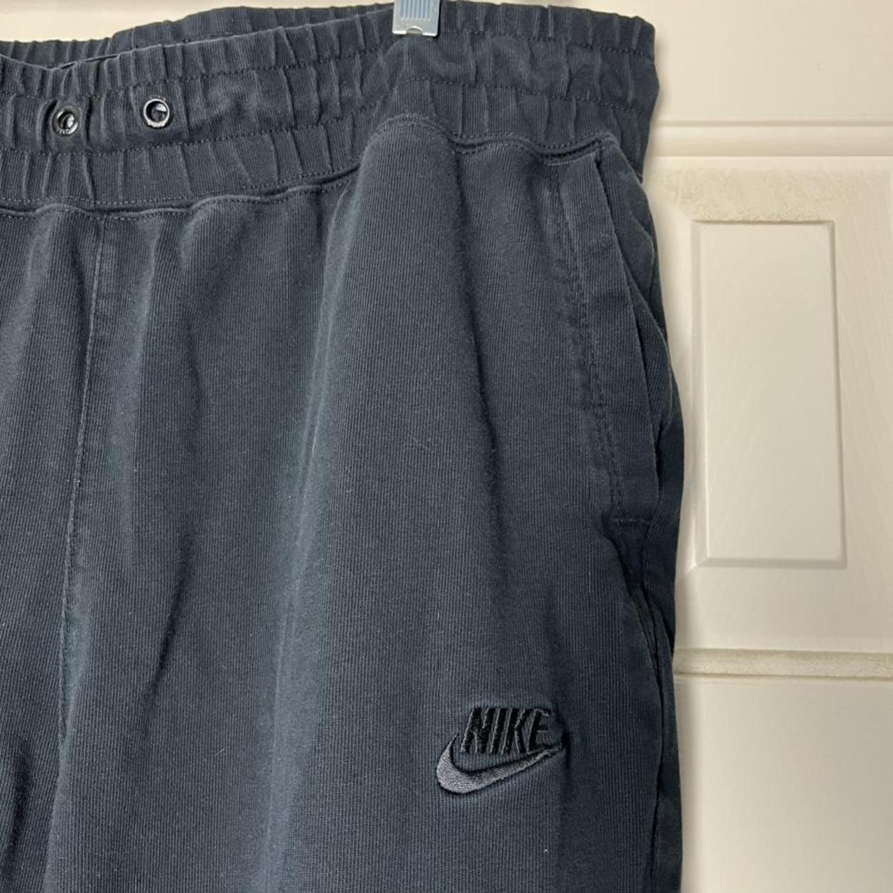 Nike tech sweatpants size large mens. Light fading... - Depop