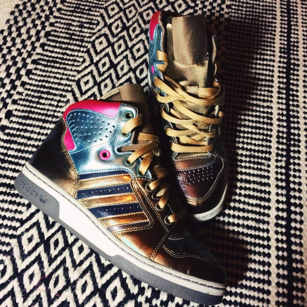 Purple and gold adidas high tops best sale