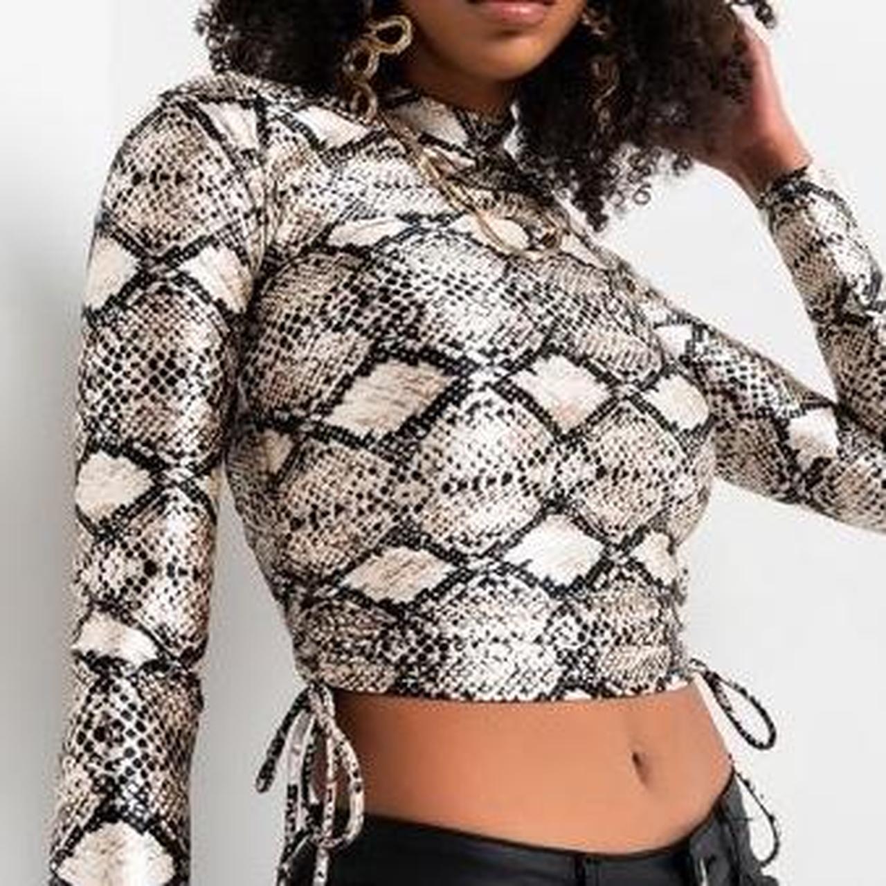 Snakeskin 2025 print turtleneck