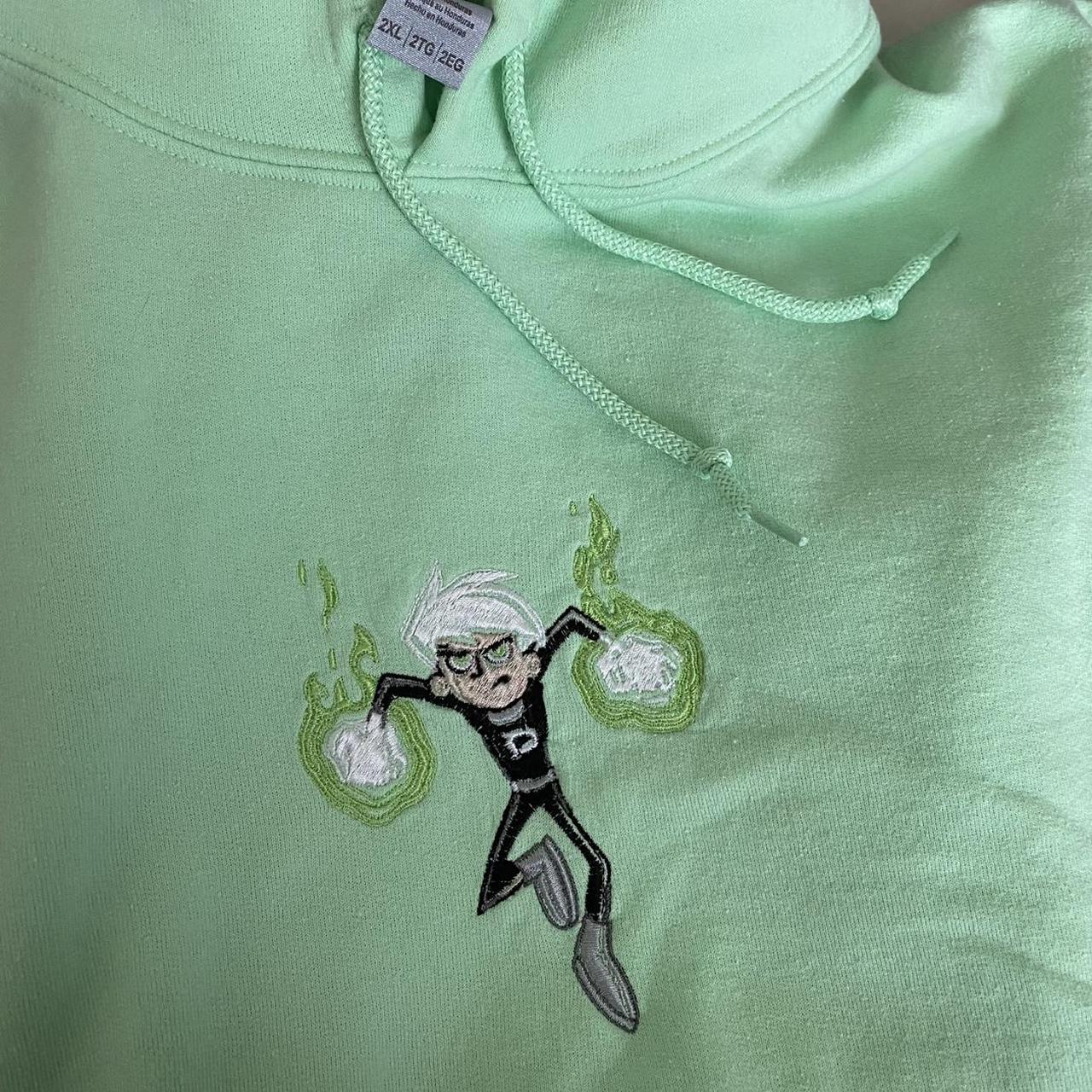 Embroidered mint green Danny Phantom hoodie. Graphic - Depop