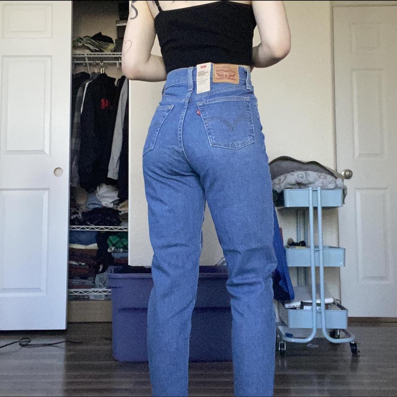 Levi's high waisted taper jeans in medium wash! - Depop