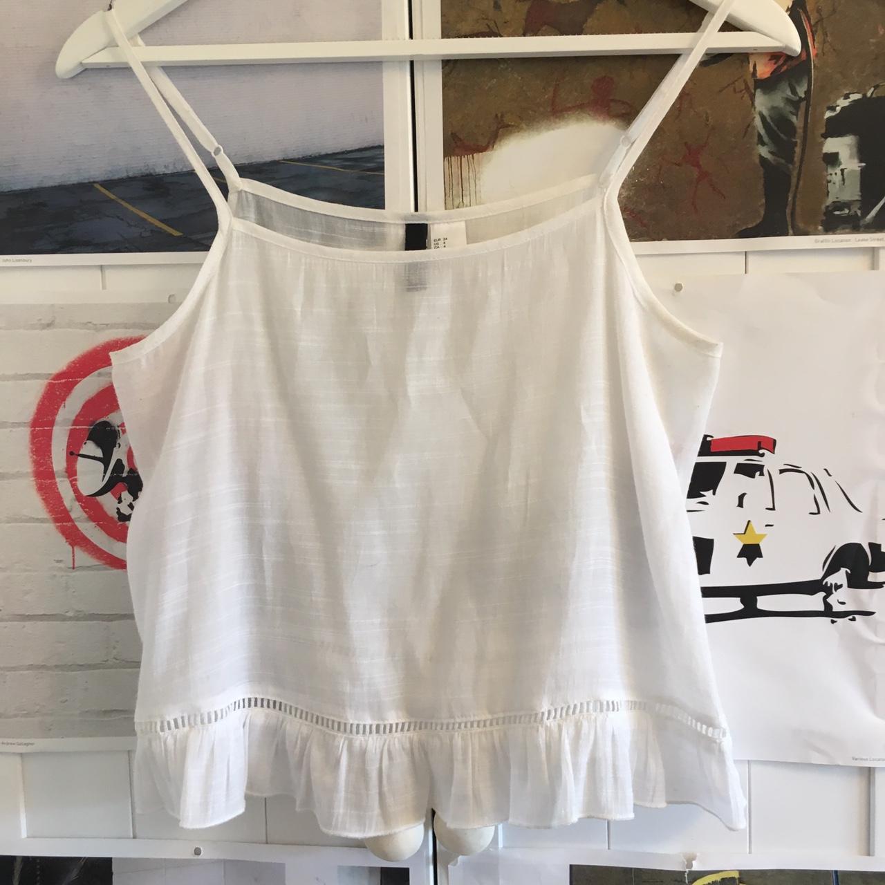 H&M white cropped top with frill detail at bottom... - Depop