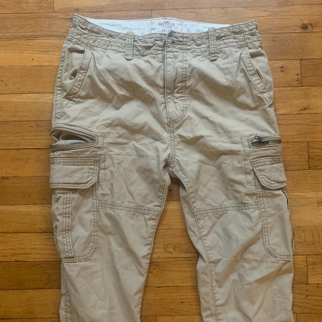 HOLLISTER BEIGE CARGO PANTS has cool pockets size... - Depop