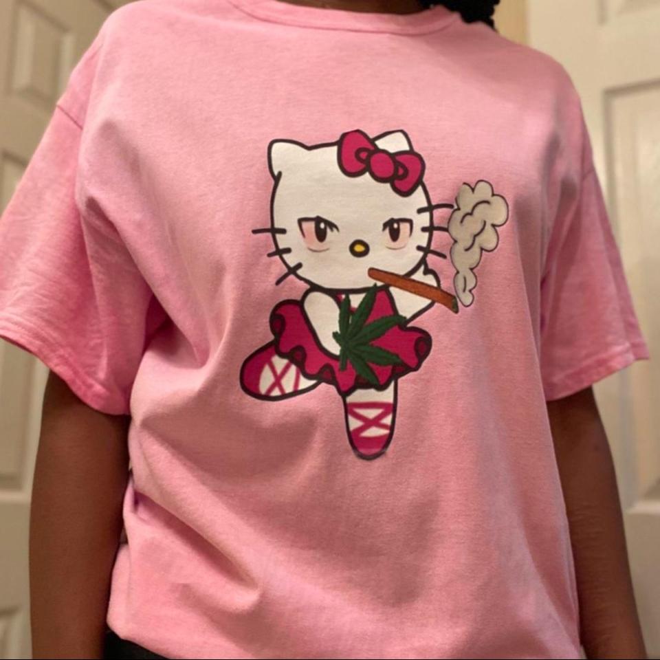 white Hello Kitty design t-shirt with four tiny - Depop