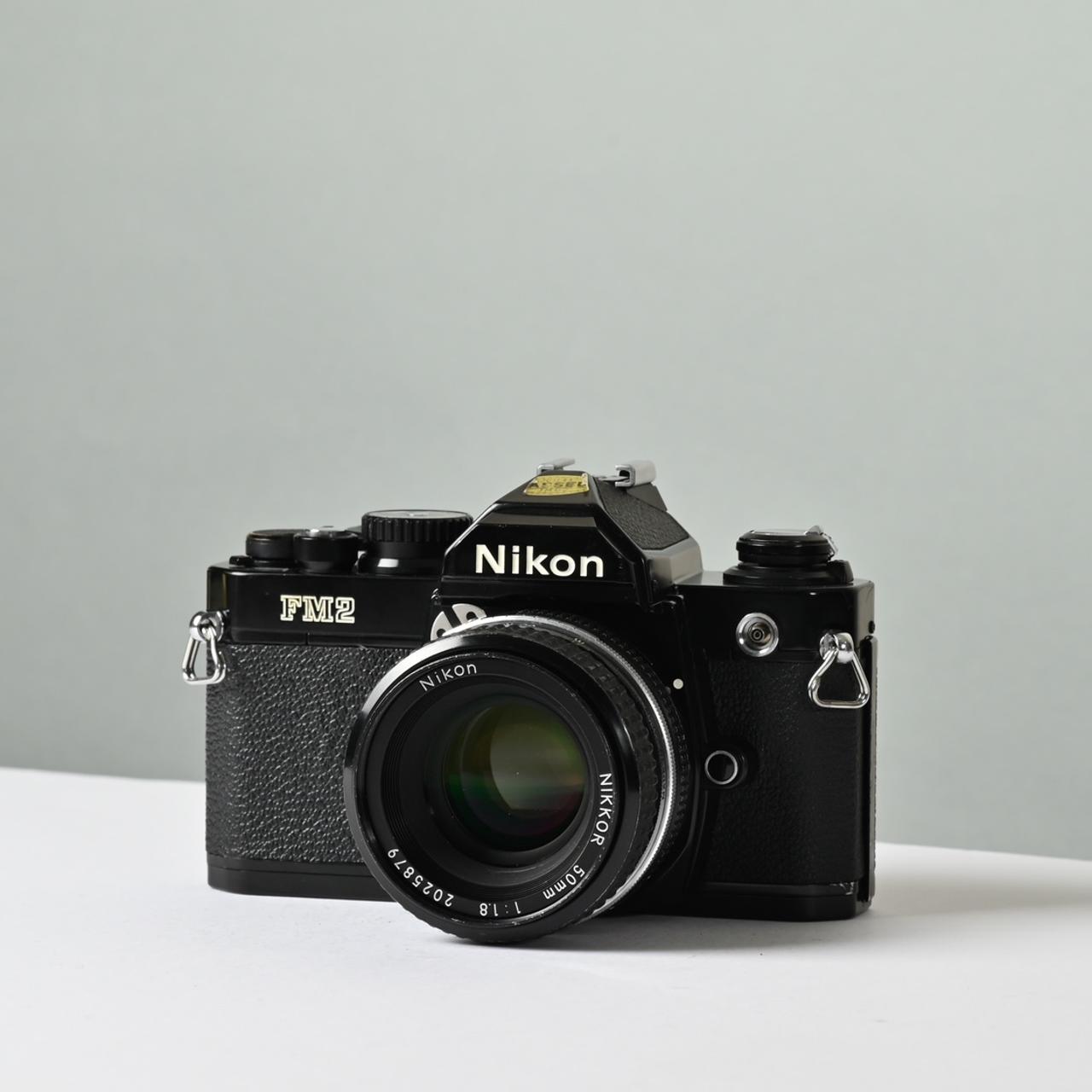 Nikon FM2 w/ AI 50mm F1.8 The Nikon FM2 is an | Depop
