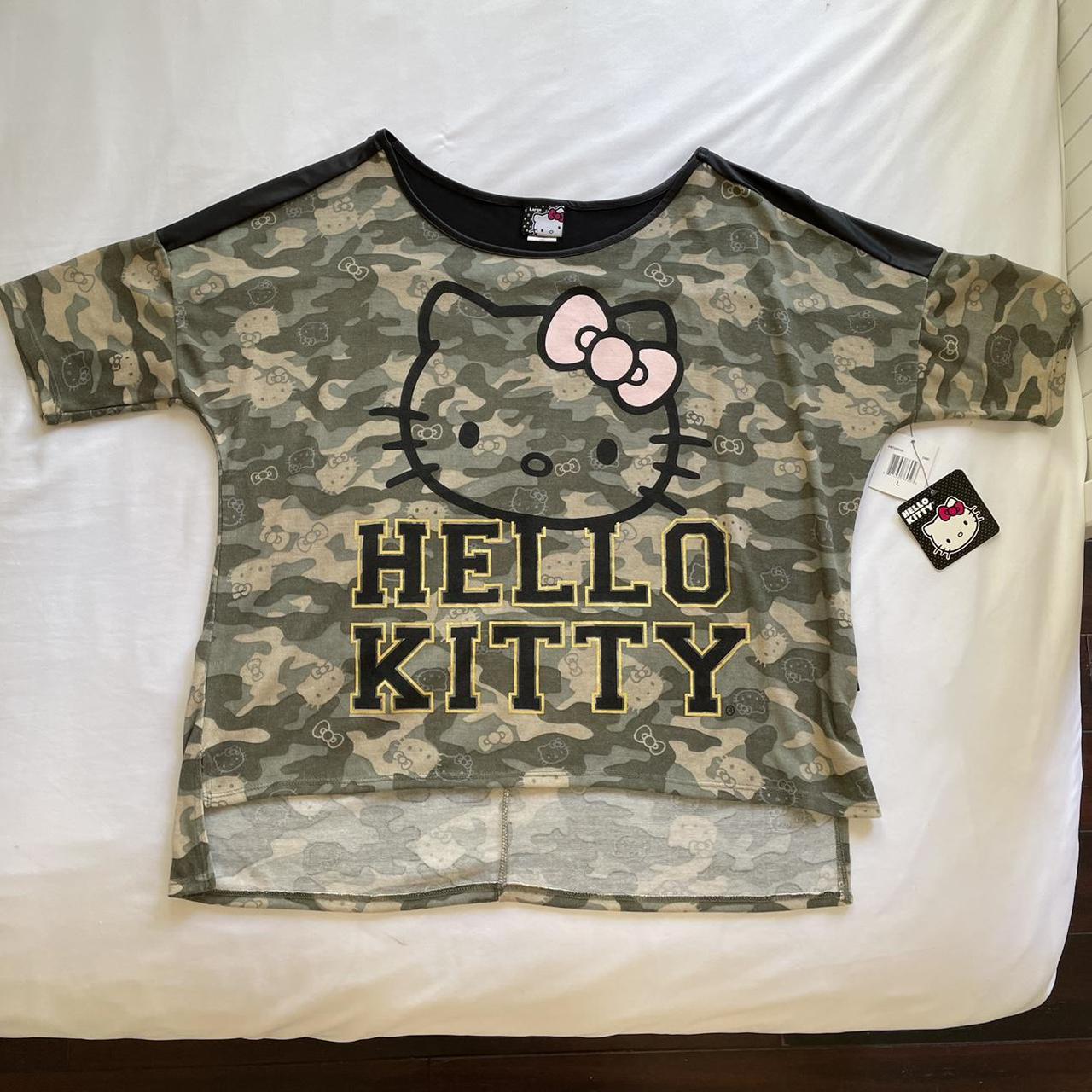 white Hello Kitty design t-shirt with four tiny - Depop