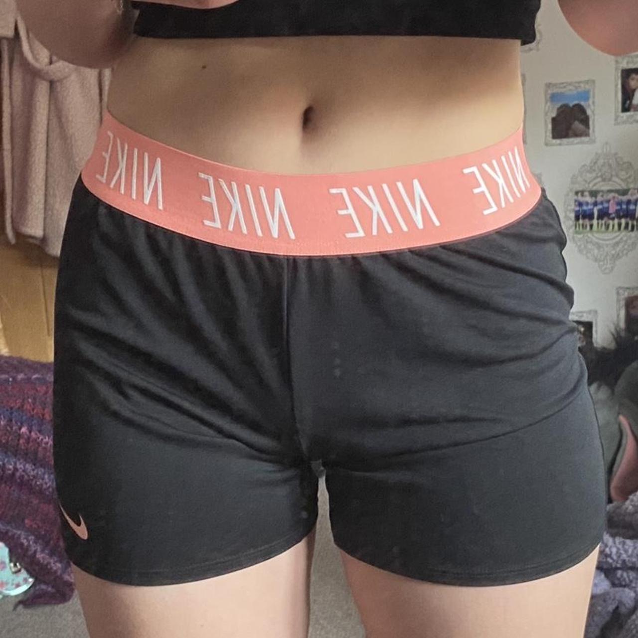 washed coral nike shorts