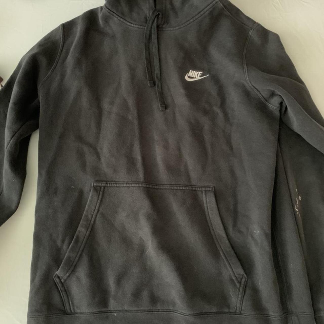 nike hoodiehas bleach stains as shown in pic size... Depop
