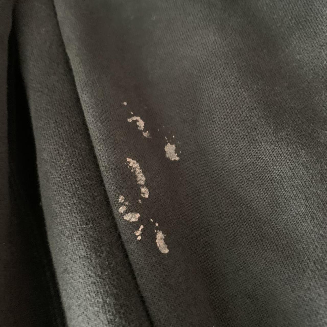 nike hoodiehas bleach stains as shown in pic size... Depop