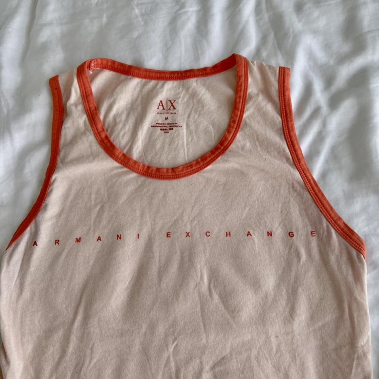 Cyber peach colored ARMANI EXCHANGE tank top with... Depop
