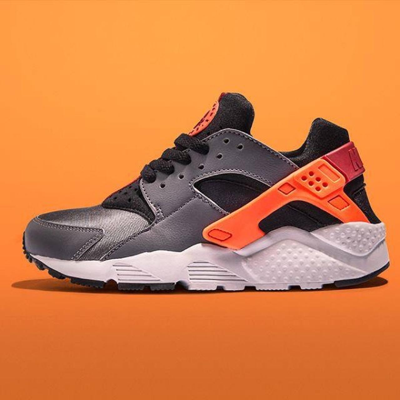 These are my Nike huaraches grey orange red black