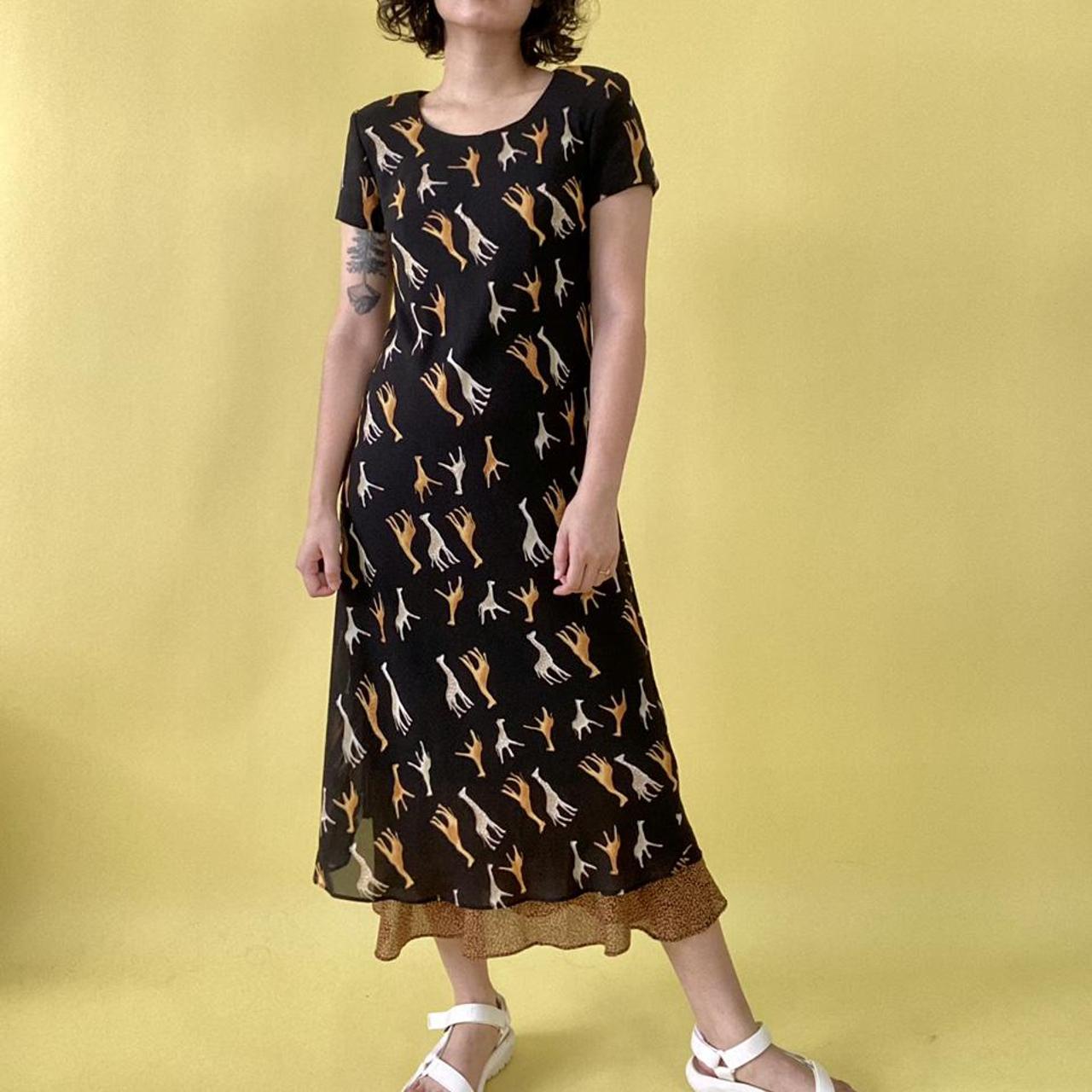 Vintage black giraffe print maxi dress. Short sleeve...