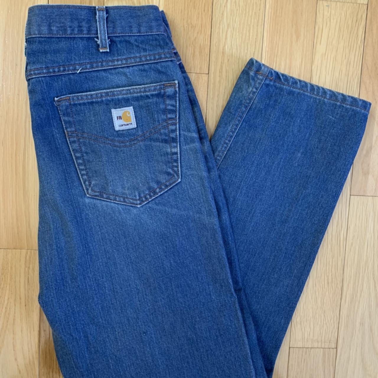 Vintage Carhartt FR blue jeans with some wear to... - Depop