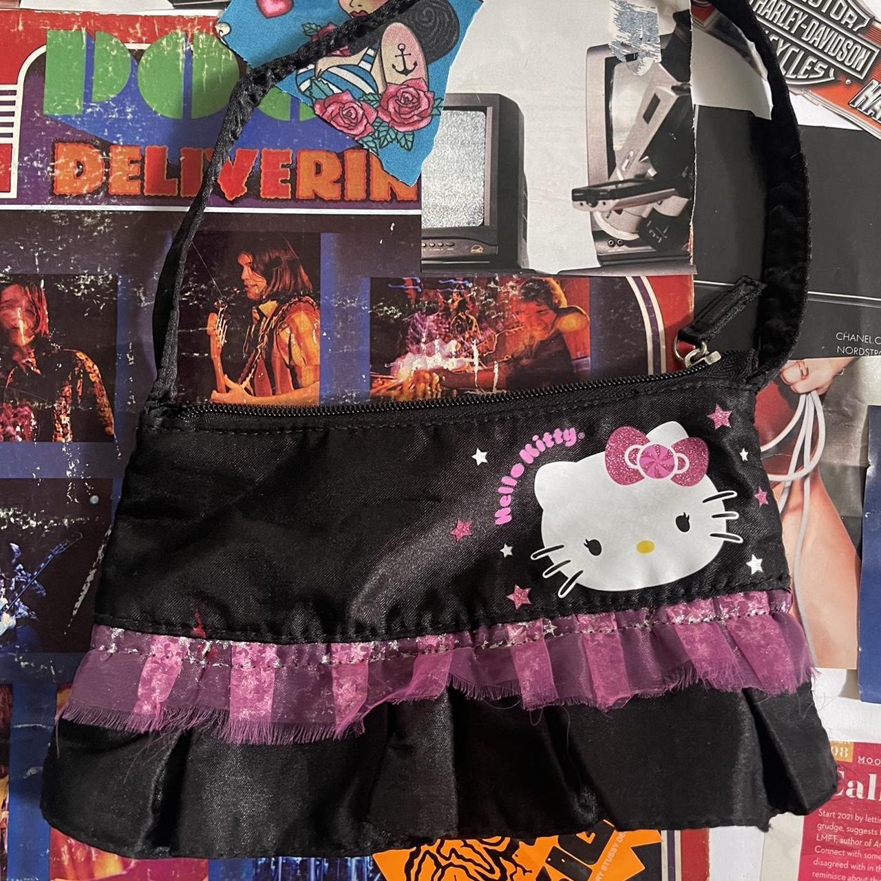 Hello kitty shoulder bag. Looks like a lil skirt!... Depop