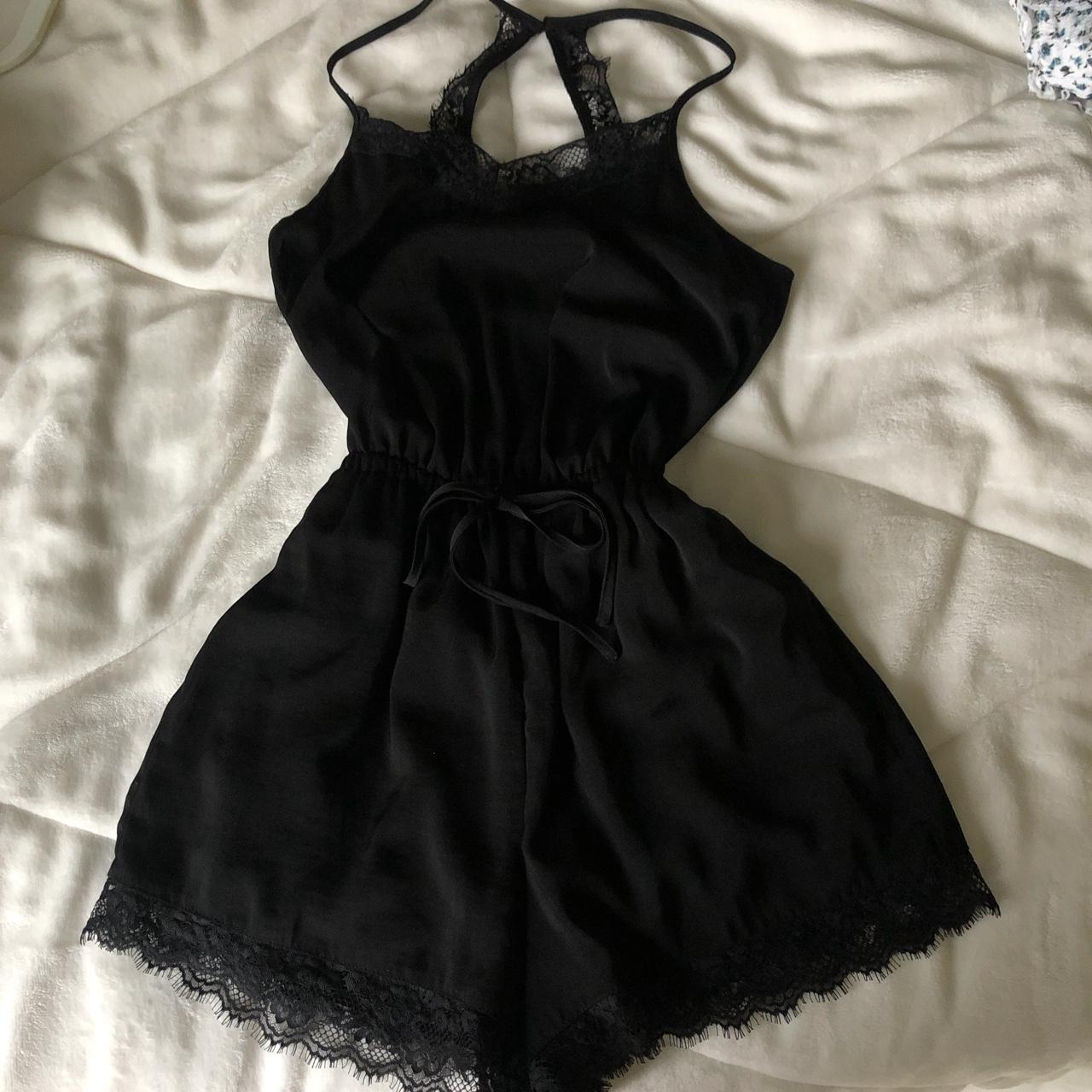 Black lace romper only worn a couple times size XS... - Depop