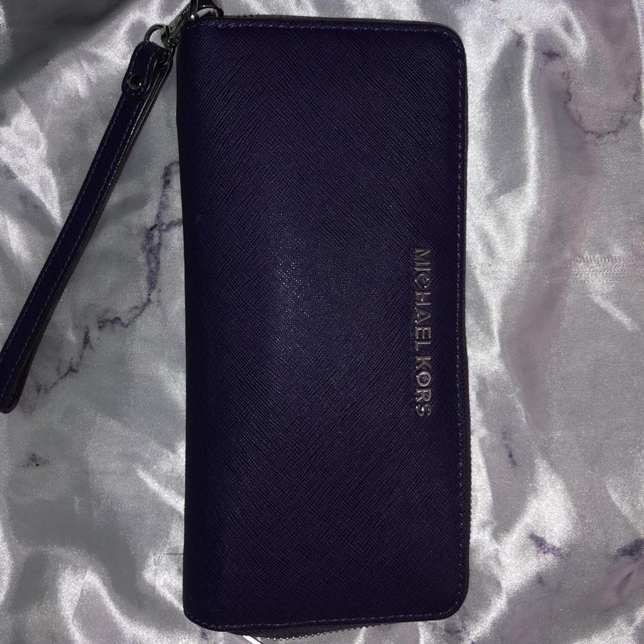 Dark Purple Michael Kors wristlet wallet. Been used... - Depop