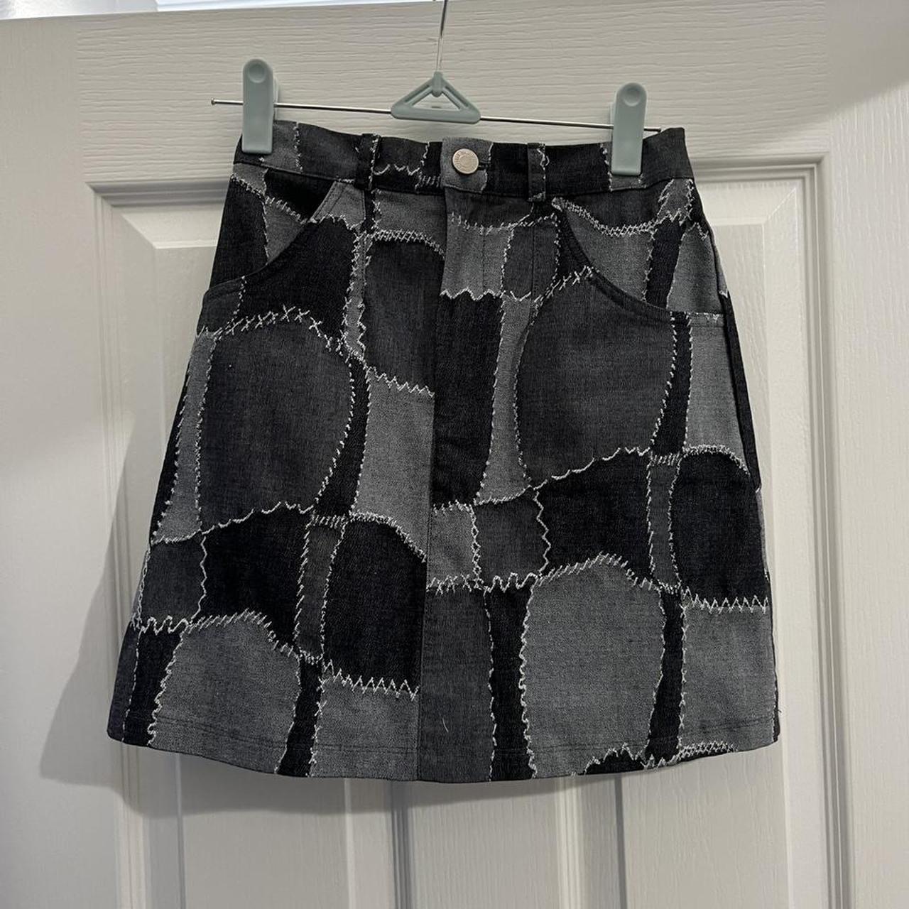 Grey mini skirt with cool design. It's a cool grey... - Depop