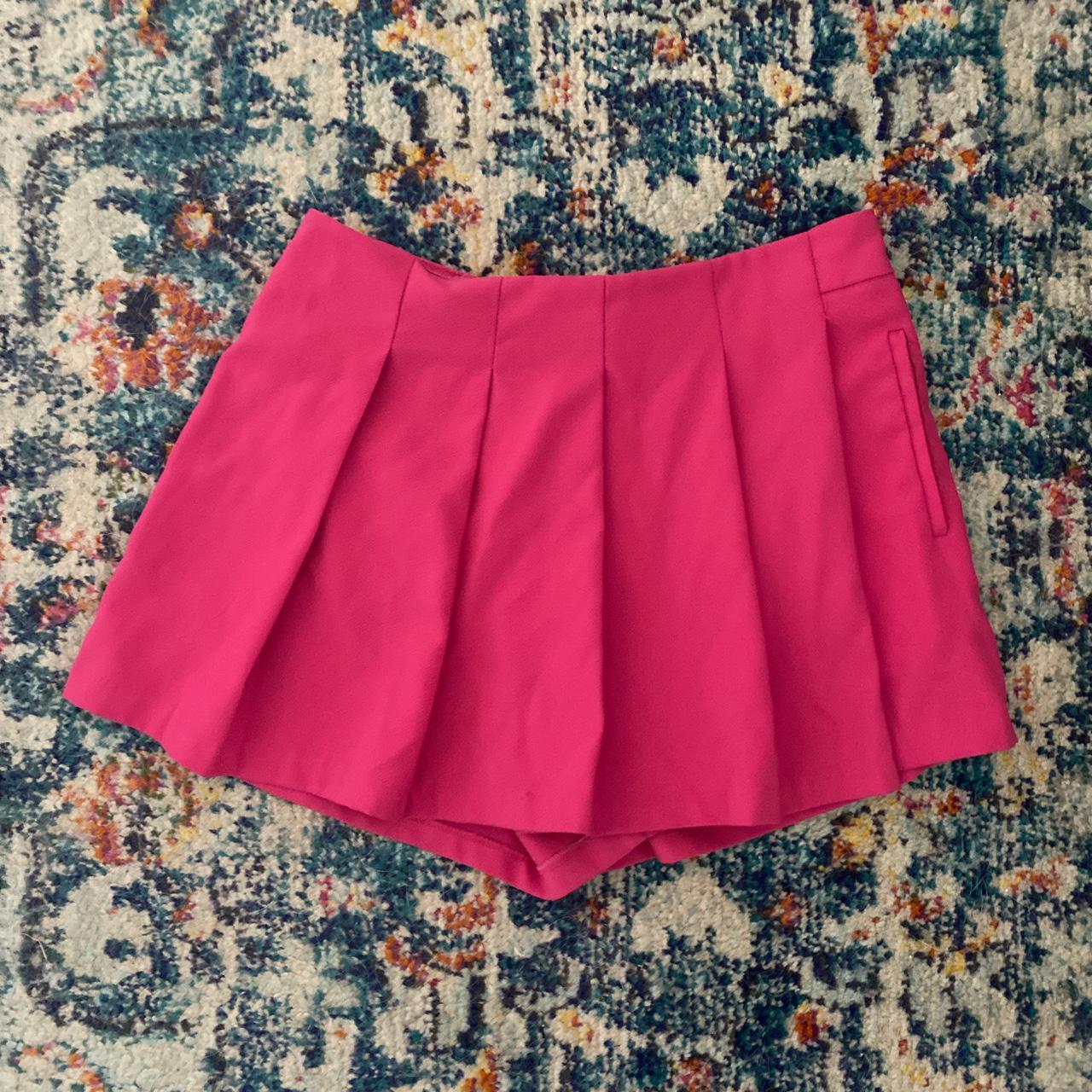 Pink Skort with pocket and pleats ok this is hands... - Depop