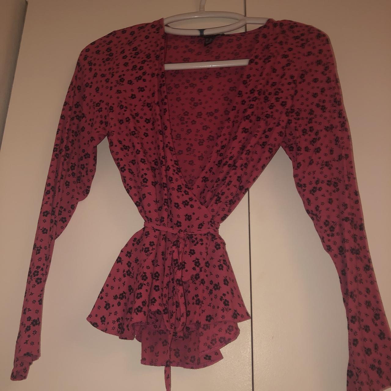 New look pink floral wrap top worn once. Size 8... Depop