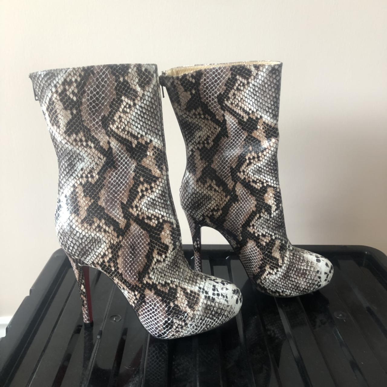 Louboutin snakeskin boots deals