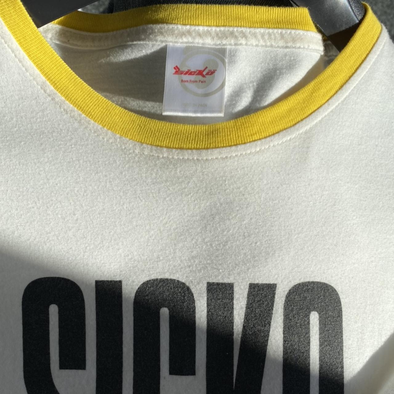 Ian Connor‘s Rex Yellow Ringer Tee - Sickö, brand...