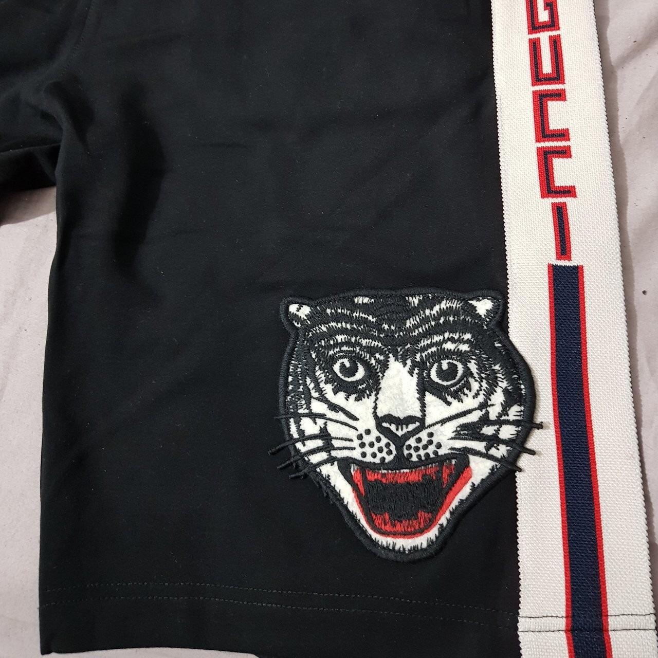 Gucci Stripe Shorts with embroidered tiger logo and... - Depop