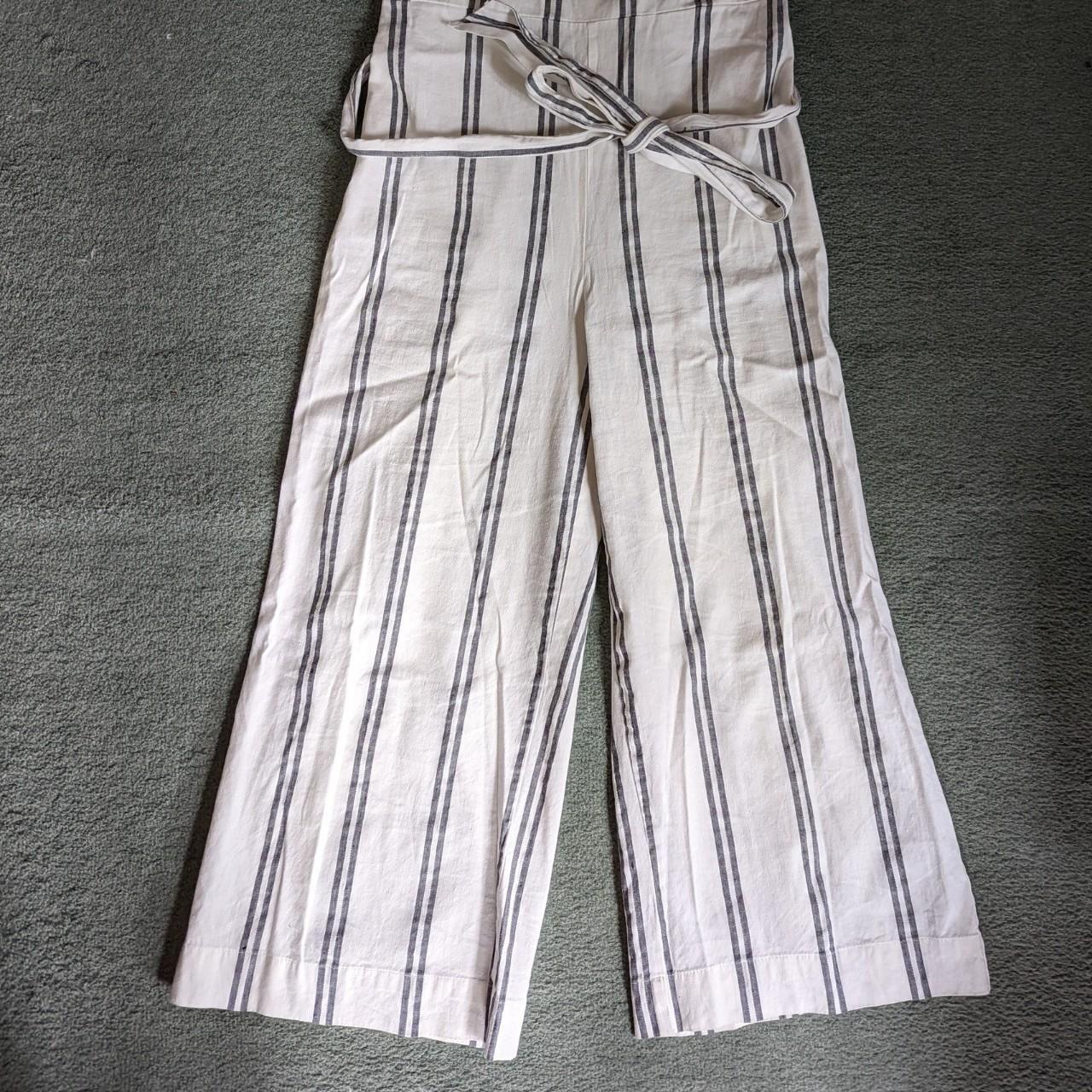 Gap jumpsuit size S. White with grey stripes. Has a... - Depop