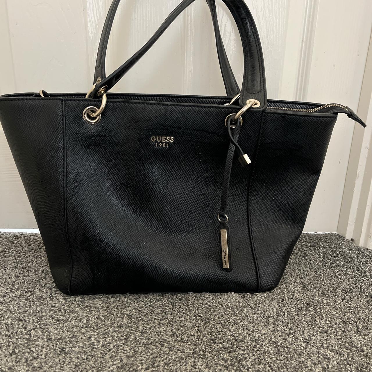 Ladies Black Guess handbag. Lining marked as shown... Depop