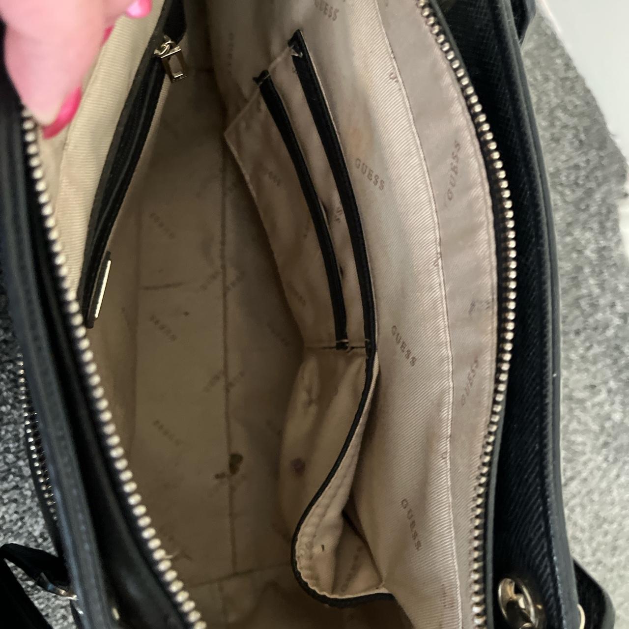 Ladies Black Guess handbag. Lining marked as shown... - Depop