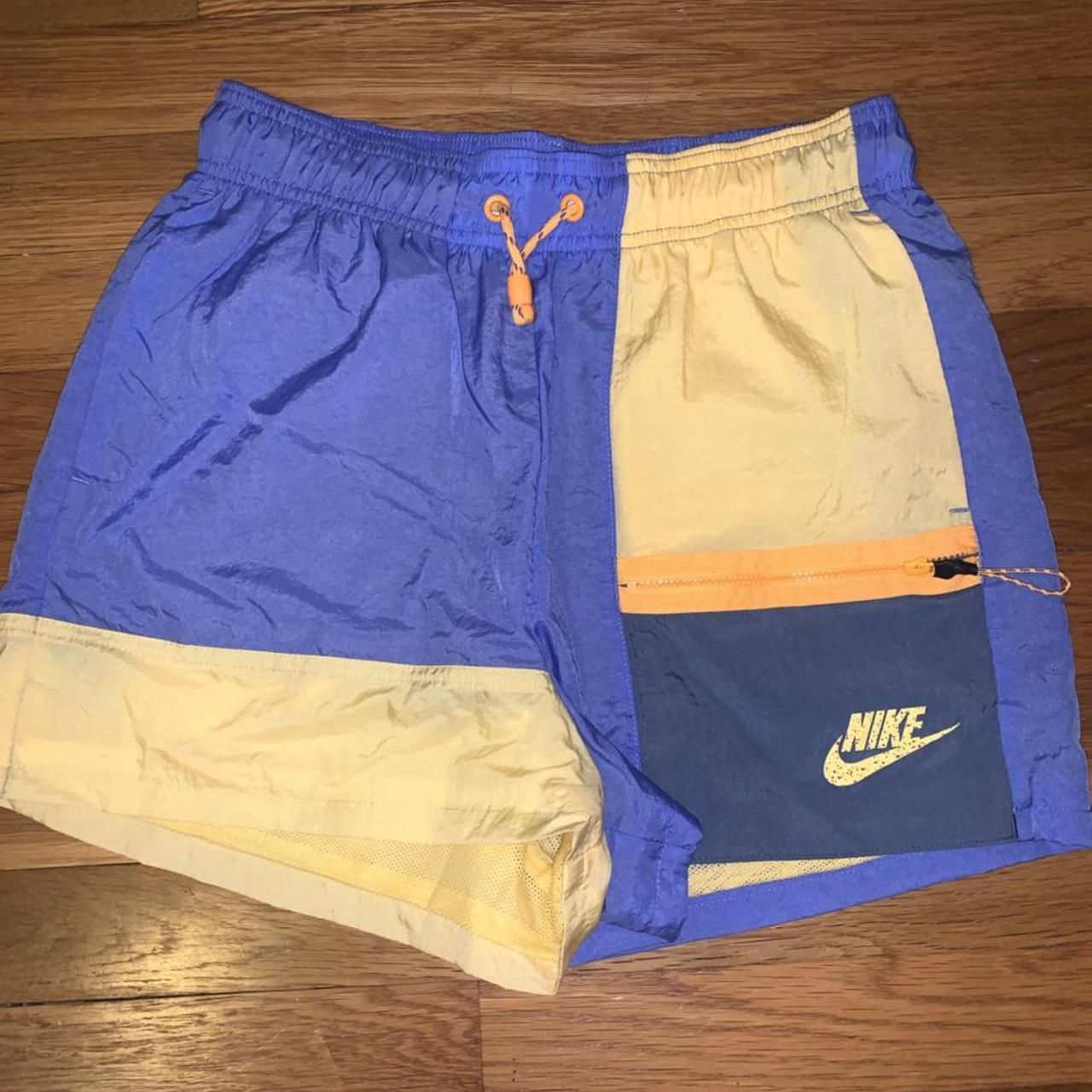 yellow and purple nike shorts