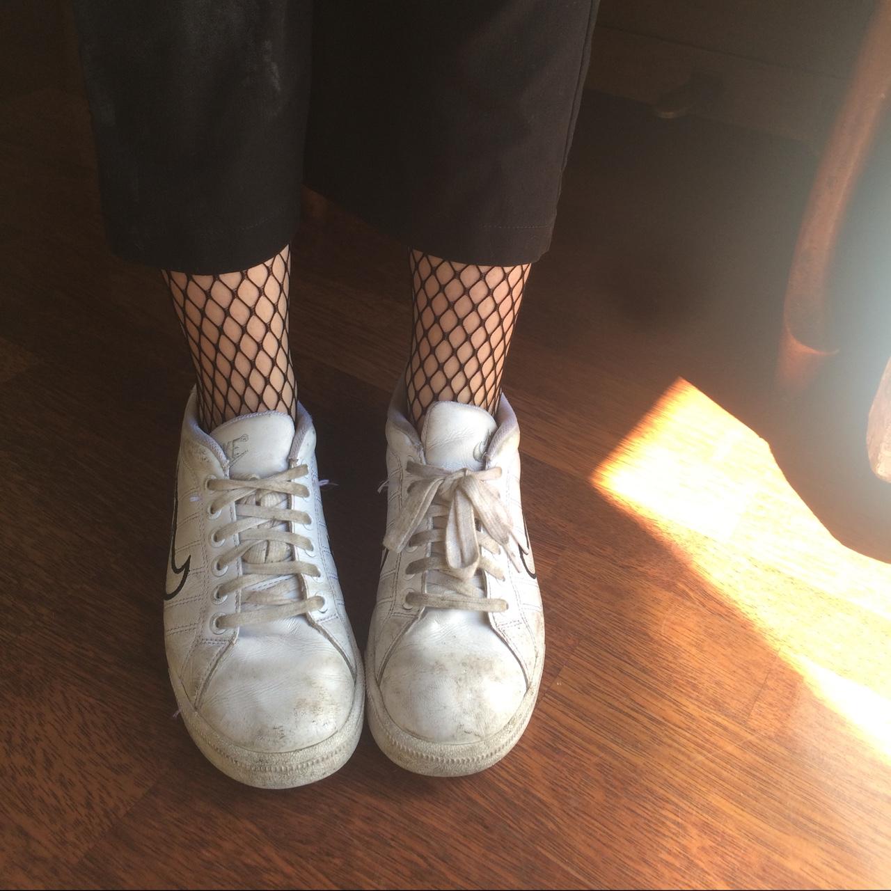 Fishnet socks and top sneakers